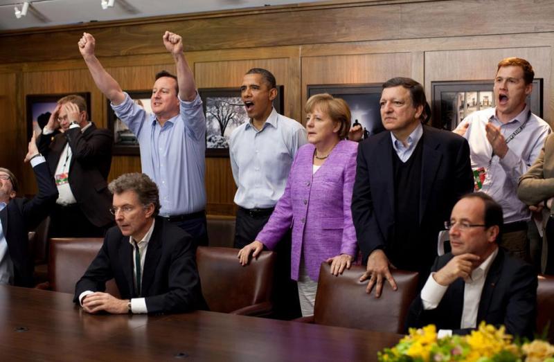 British Prime Minister David Cameron lets out a cheer as he watches the penalty shootouts of the Chelsea vs Bayern Munich Champions league final with President Obama, Chancellor Merkel, José Manuel Barroso, President of the European Commission, and others.  Photo credit: White House/Pete Souza